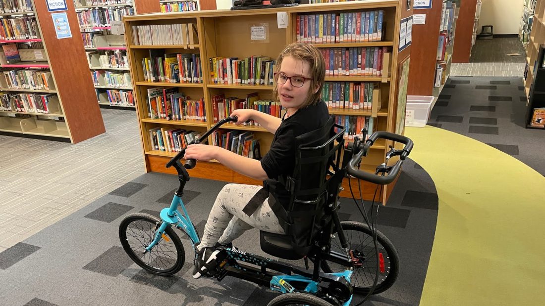 Here I A’M RIDING MY BIKE AT THE JAKE UP LIBRARY WHERE MY MOM WORK’S FOR THE VERY FIRST TIME IT WAS SO VERY EXCITING FOR ME