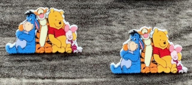 Winnie the Pooh and his friends earrings that I am thinking to get from my ears