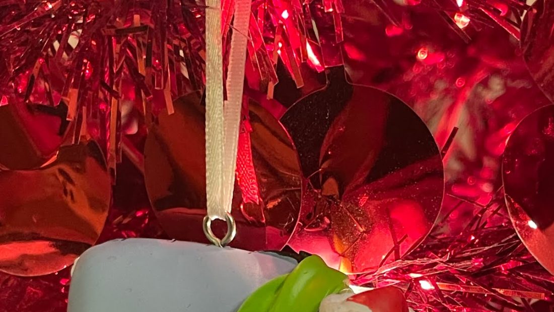 Eeyore ornament on my red Christmas tree